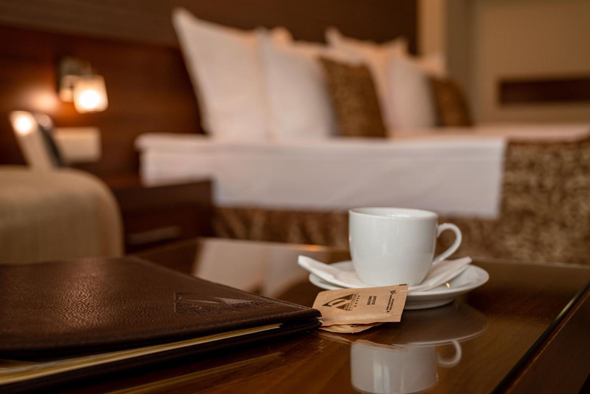 Spa Hotel Persenk Devin Esterno foto A coffee cup in a hotel room